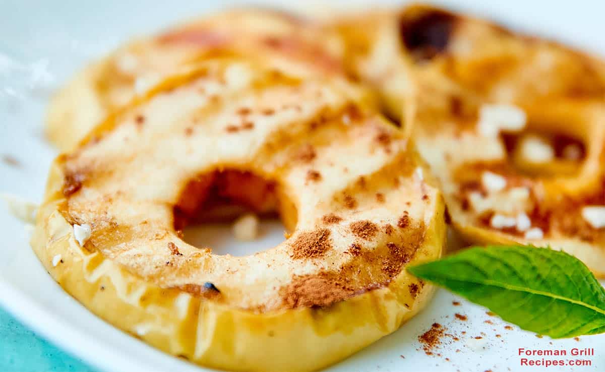 Grilled apple slices on a plate